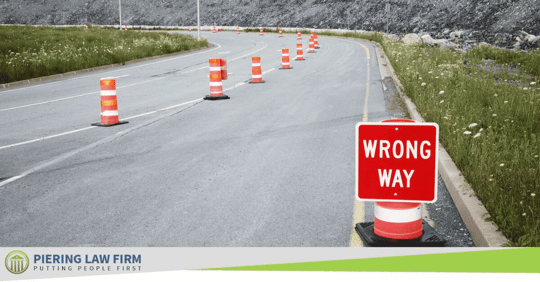 wrong way sign on a road