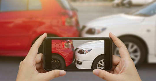taking a picture of car accident