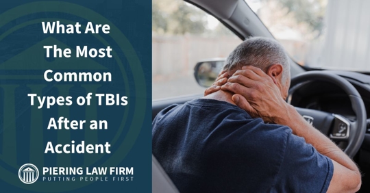 Injured driver holding neck